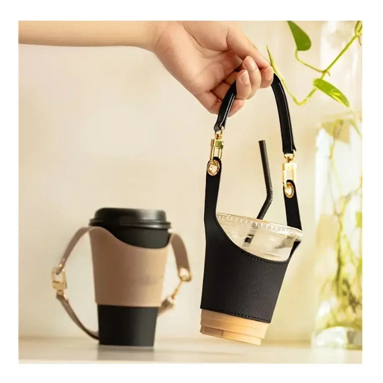 Mockup featuring a Black Leather Cup Sleeve alongside a Pink Leather Cup Sleeve, showcasing their stylish design and insulating properties. Both sleeves are crafted from high-quality PU leather, offering a secure and non-slip grip for coffee and tea cups.