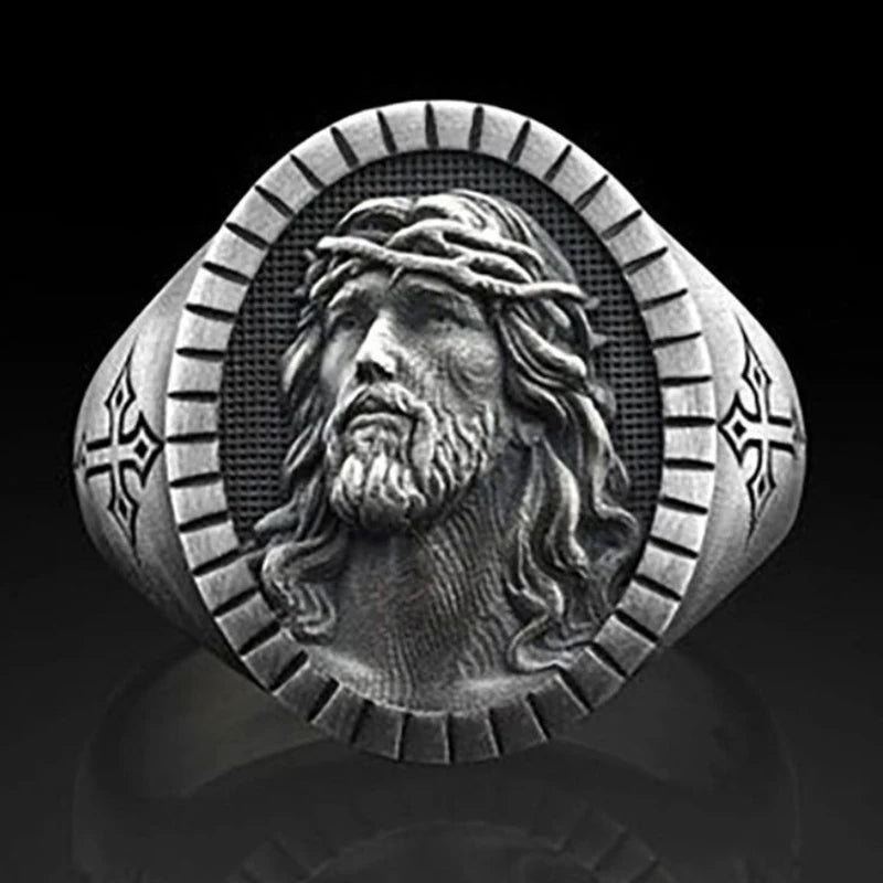 Front of the Ring with Jesus: "Front view of the Classic Men's Punk Cross Ring, showcasing an intricate depiction of Jesus. The ring is made from stainless steel with a zinc alloy base, combining Christian symbolism with punk style.