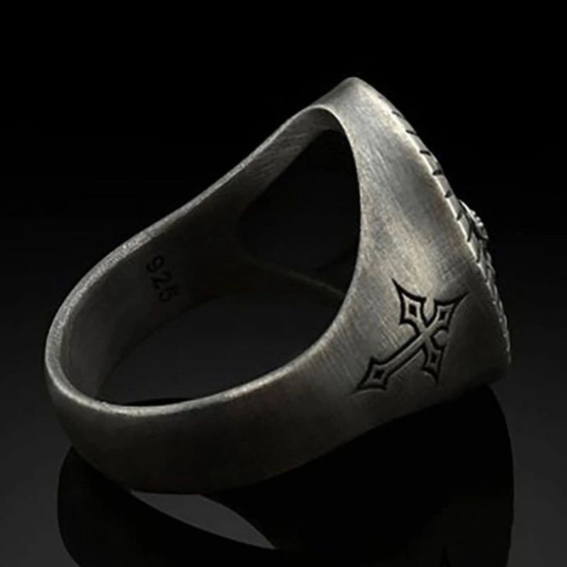 Mockup Model of Cross on the Side and Backdrop: "Mockup of the Classic Men's Punk Cross Ring on a model's finger, showcasing the cross design on the side. Set against a neutral backdrop to emphasize the ring's intricate details and bold style.