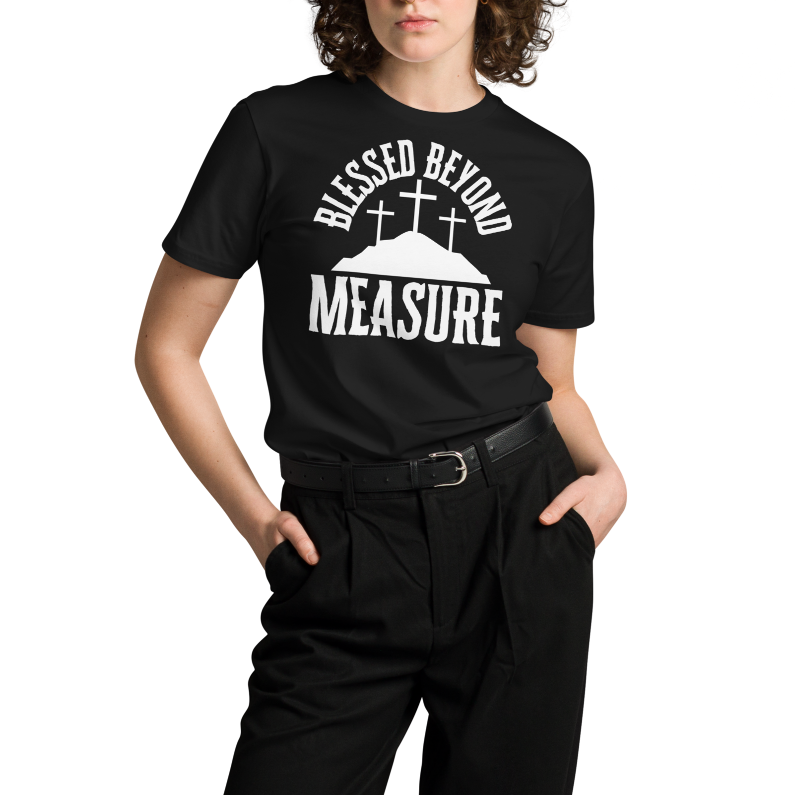"Female model wearing the 'Blessed Beyond Measure' T-shirt in black, stylishly tucked into her outfit. The bold white lettering stands out, showing the versatile and faith-inspired design by Heavenly Crafted, perfect for a chic and spiritual look.
