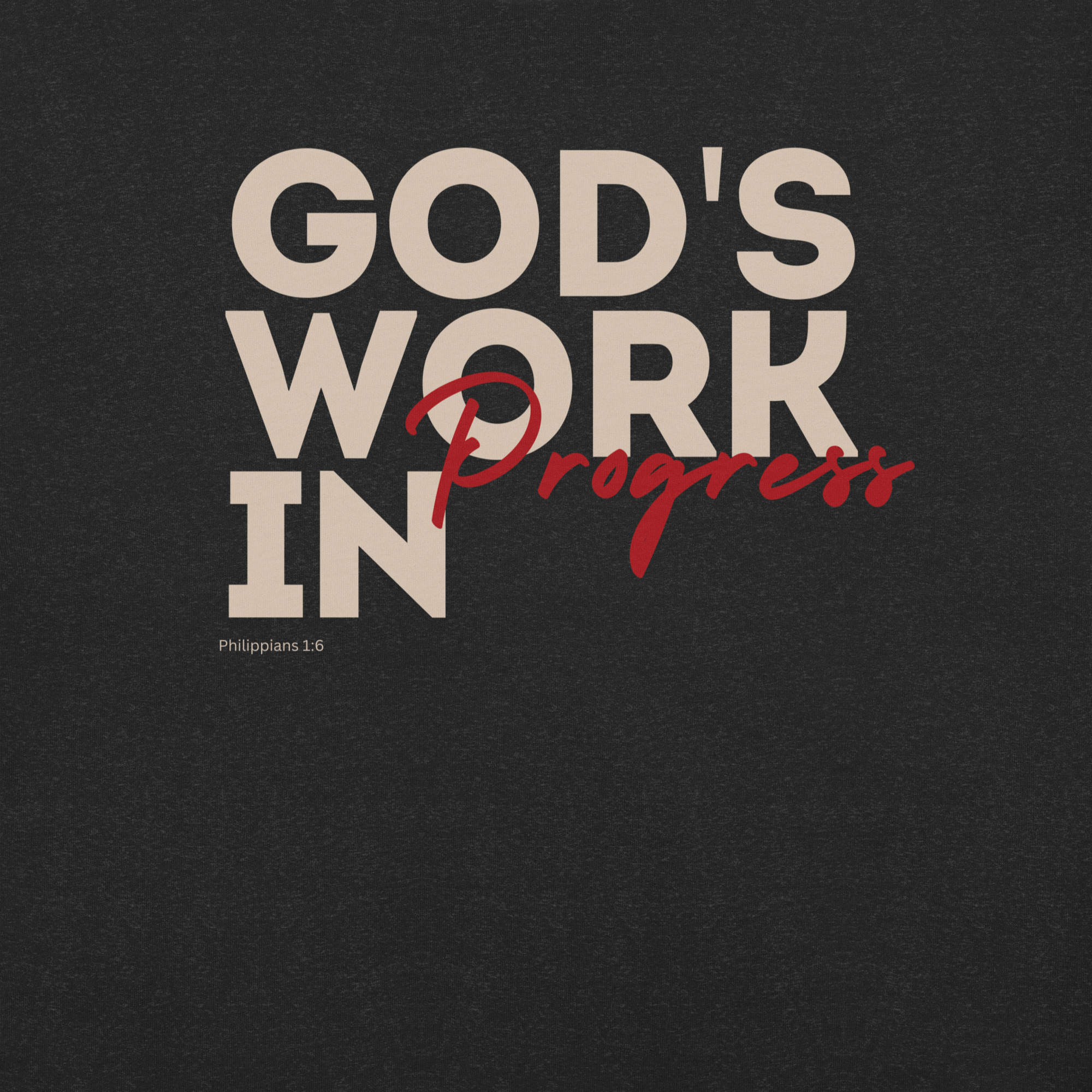 Front view of Heavenly Crafted's 'God's Work in Progress' T-shirt in Charcoal Black with bold white text. Inspired by Philippians 1:6, it's a reminder of God's ongoing work in your life.