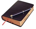 Closed Blank Book with Bible look and a pen resting on top, featuring an elegant PU leather cover. Perfect for personal reflections, journaling, and capturing thoughts and prayers.
