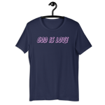 Heavenly Crafted's 'God Is Love' T-shirt in Navy hanging on a wooden hanger, showcasing the neon text design on the front. A perfect blend of faith and fashion for everyday wear.