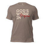 3D mockup of Heavenly Crafted's 'God's Work in Progress' T-shirt in Tan, featuring an elegant and bold text design inspired by Philippians 1:6. A faith-inspired tee for continuous spiritual growth.