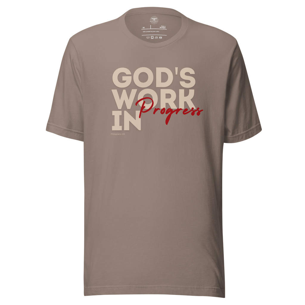 3D mockup of Heavenly Crafted's 'God's Work in Progress' Relaxed T-shirt in Tan, featuring an elegant and bold text design inspired by Philippians 1:6. A faith-inspired tee for continuous spiritual growth.