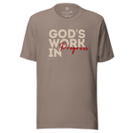 3D mockup of Heavenly Crafted's 'God's Work in Progress' Relaxed T-shirt in Tan, featuring an elegant and bold text design inspired by Philippians 1:6. A faith-inspired tee for continuous spiritual growth.