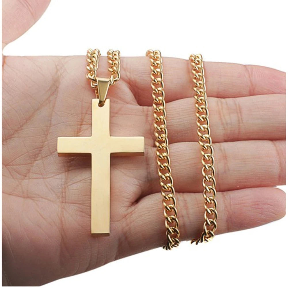 Faith-Inspired Jewelry for Men by Heavenly Crafted - Gold chain and cross pendant held in hand, highlighting its elegant design and spiritual significance.