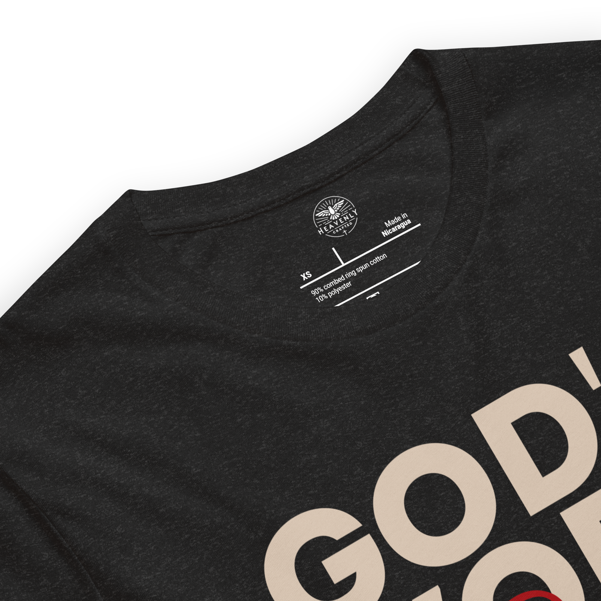 Close-up of the logo tag and neckline on Heavenly Crafted's 'God's Work in Progress' T-shirt. Highlights quality craftsmanship and the soft, durable fabric used in this faith-inspired apparel.
