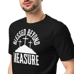 Male model in a 3/4 pose, waist up, wearing the 'Blessed Beyond Measure' T-shirt in black. Showcasing the bold white lettering and comfortable fit of this Heavenly Crafted faith-inspired apparel, perfect for daily wear and spiritual gatherings.