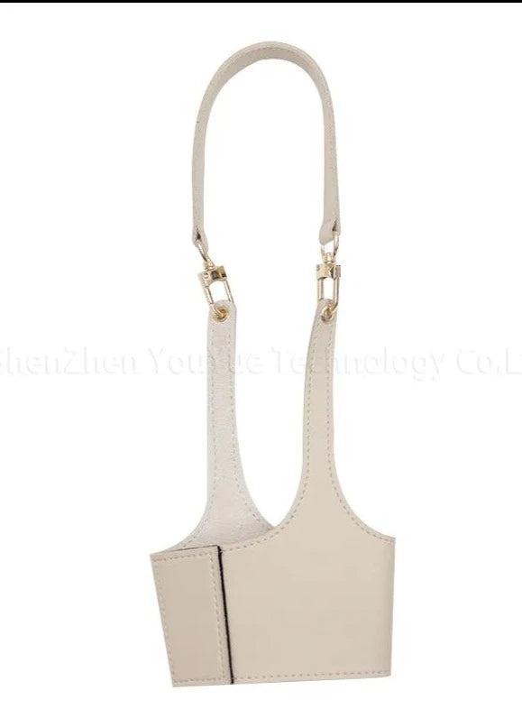 White Leather: "White Leather Cup Sleeve, an elegant and insulated holder for coffee and tea cups. Crafted from durable PU leather, offering a clean and stylish appearance with a non-slip grip.