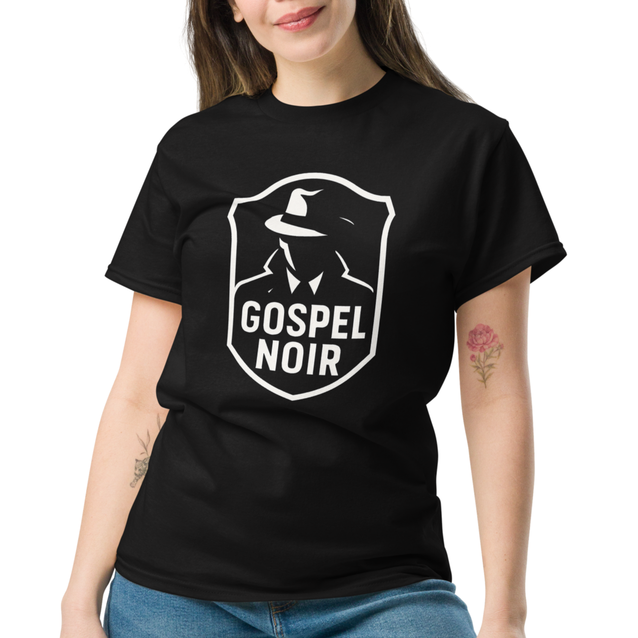Female model wearing Gospel Noir black cotton t‑shirt – front view, relaxed streetwear style