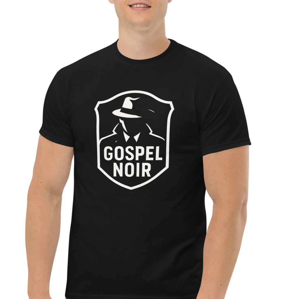 Male model wearing Gospel Noir black cotton t‑shirt – front view, structured fit
