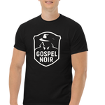 Male model wearing Gospel Noir black cotton t‑shirt – front view, structured fit
