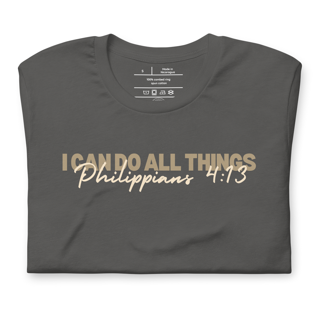 Folded Asphalt T-shirt with 'I Can Do All Things' in light brown script.