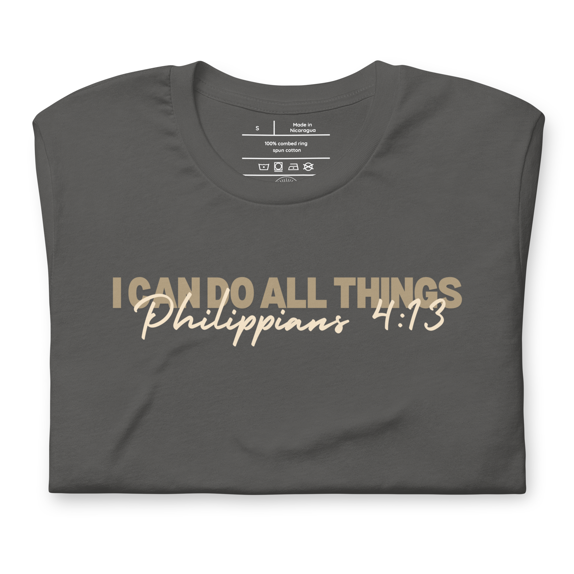 Folded Asphalt T-shirt with 'I Can Do All Things' in light brown script.