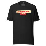 Folded Black Heather T-shirt featuring 'Let Your Light Shine' in bold yellow script. Crafted from soft, breathable cotton, this shirt combines comfort and style with an inspiring message of faith.