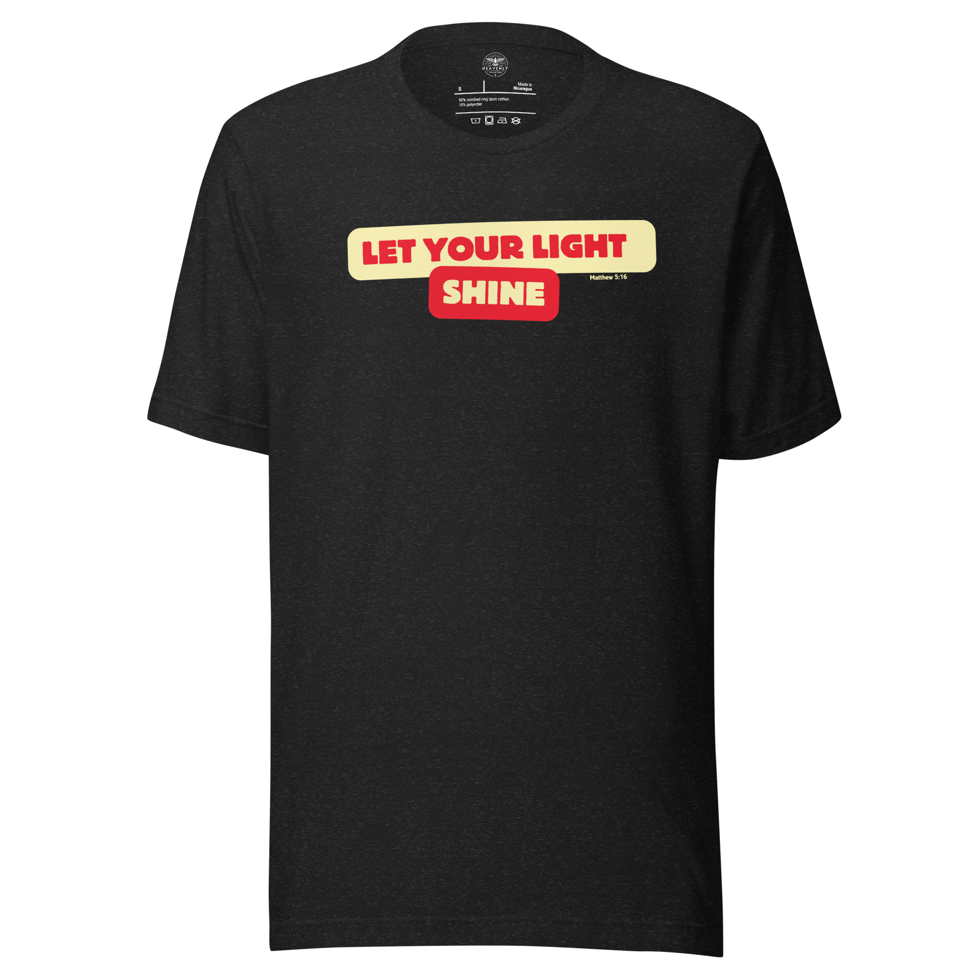 Folded Black Heather T-shirt featuring 'Let Your Light Shine' in bold yellow script. Crafted from soft, breathable cotton, this shirt combines comfort and style with an inspiring message of faith.
