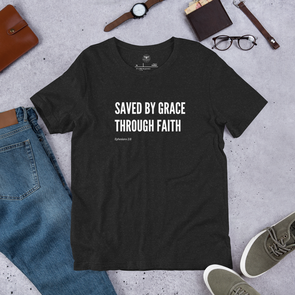 Main display mockup of 'Saved by Grace Through Faith' T-shirt in Black Heather.