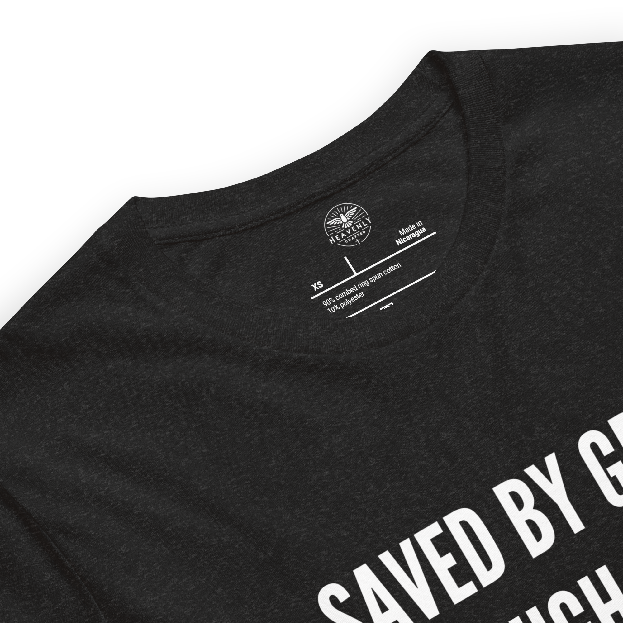 Logo stamp inside Black Heather 'Saved by Grace Through Faith' T-shirt, showing brand and care instructions.