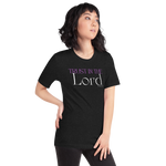 Model wearing 'Trust in the Lord' T-shirt in Black Heather, three-quarter view.