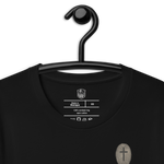 Unsolved He Is Risen black Christian t-shirt displayed on hanger Close up Hanger Logo Shot