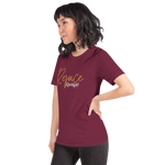 Model wearing 'Rejoice Always' black T-shirt, three-quarter view.