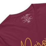 Inside label of 'Rejoice Always' T-shirt showing brand and care instructions.