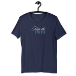 Front view of 'Keep the Faith' T-shirt hanging on a wooden hanger.