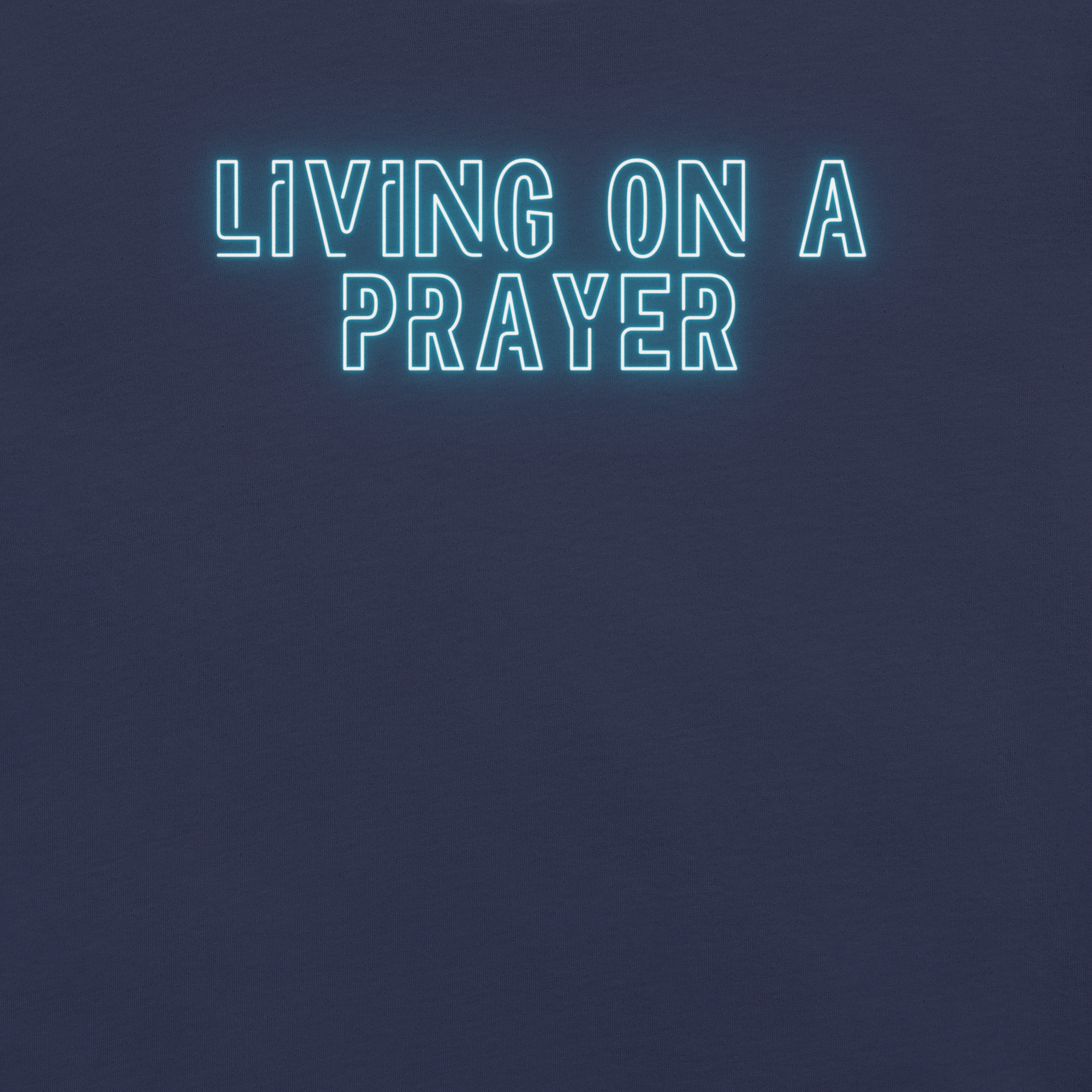 Close-up of neon 'Living on a Prayer' text on navy T-shirt, glowing effect.