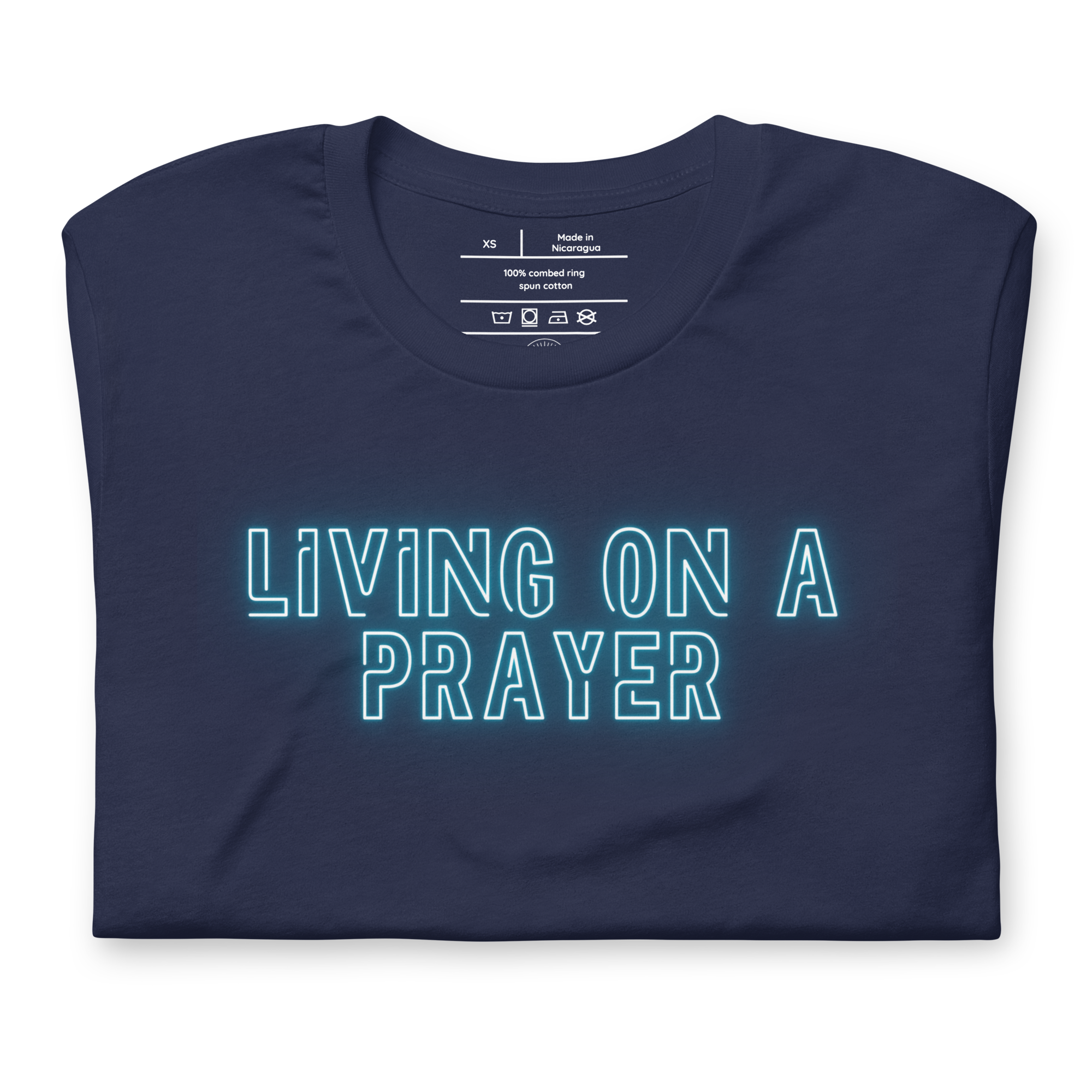 Folded navy T-shirt with 'Living on a Prayer' in vibrant neon lights script.