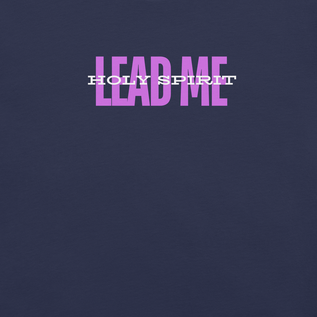 Logo stamp inside 'Holy Spirit Lead Me' T-shirt, showing brand and care instructions.