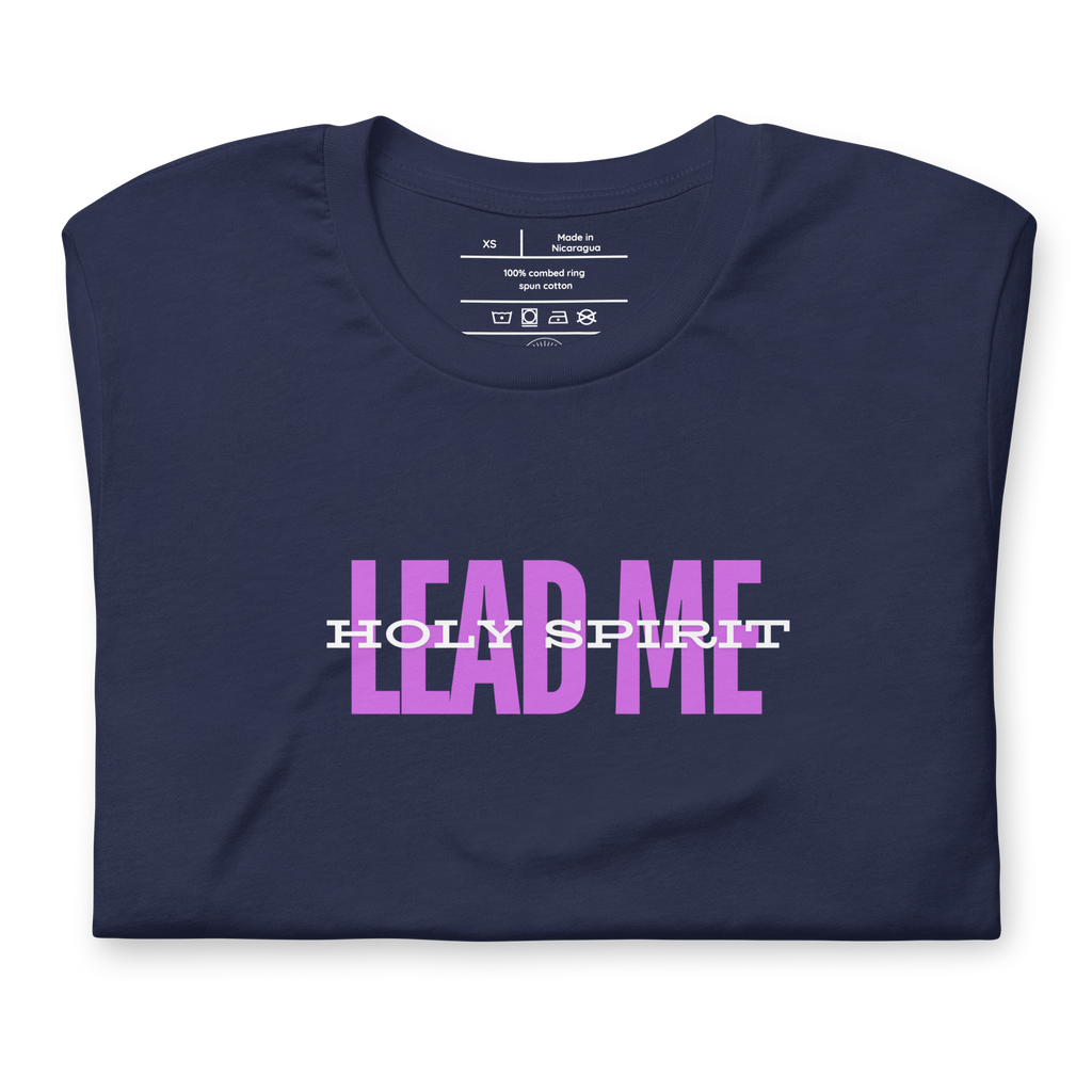 Folded navy T-shirt with 'Holy Spirit Lead Me' in white text.