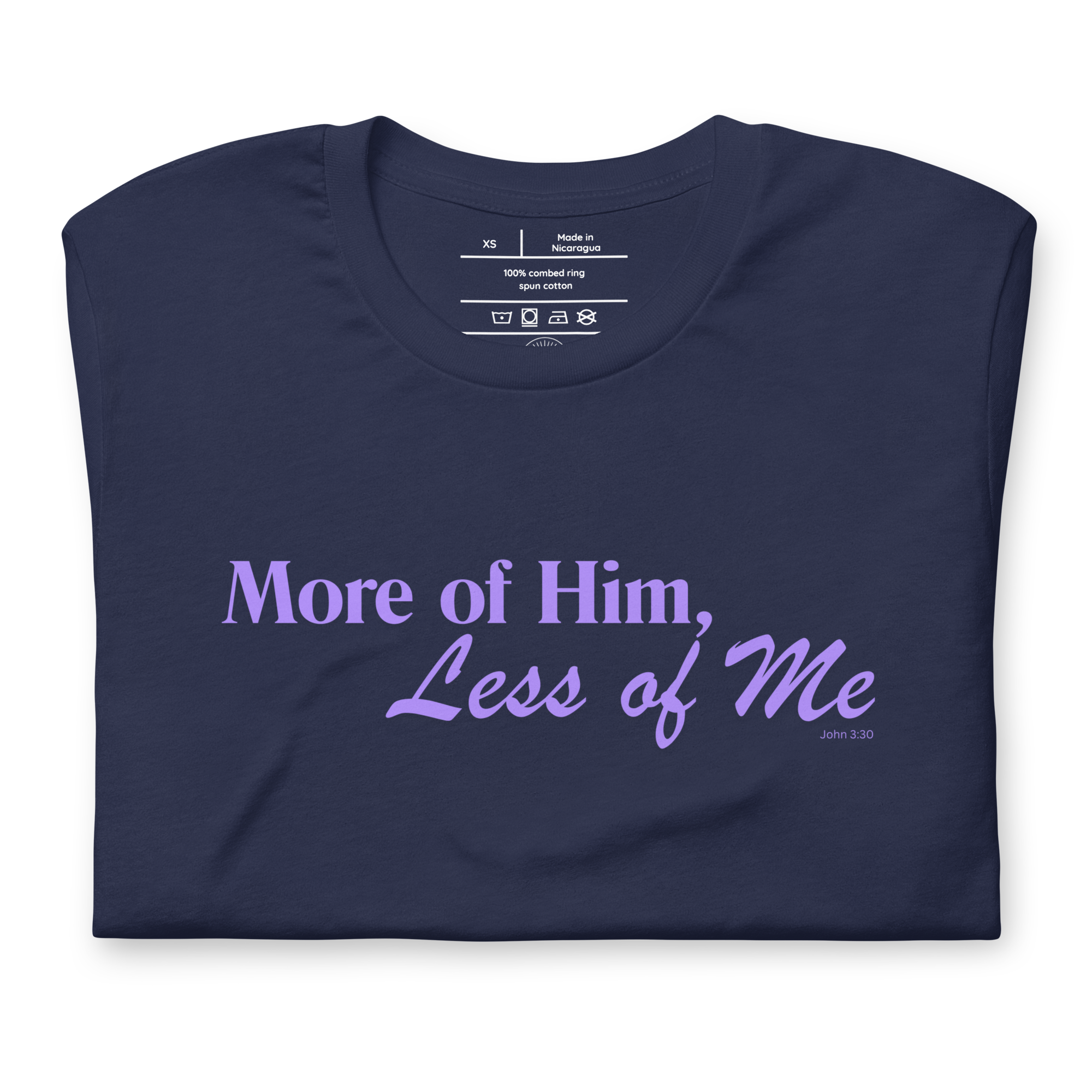 Navy folded T-shirt with 'More of Him, Less of Me' in white script.