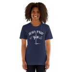 Model wearing 'Jesus Paid It All' black T-shirt, three-quarter view.