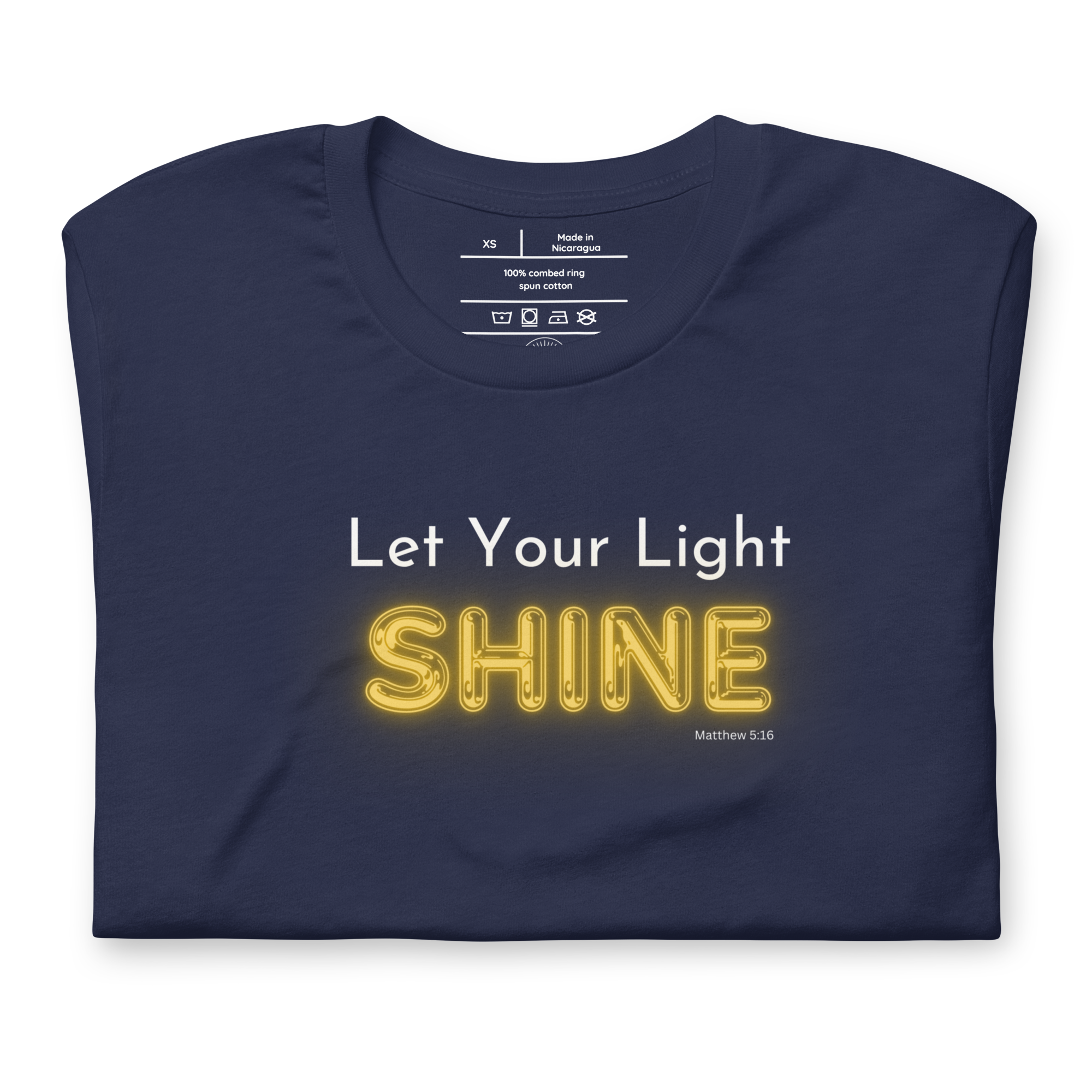 Front view of 'Let Your Light Shine' T-shirt, navy blue with glowing yellow text.