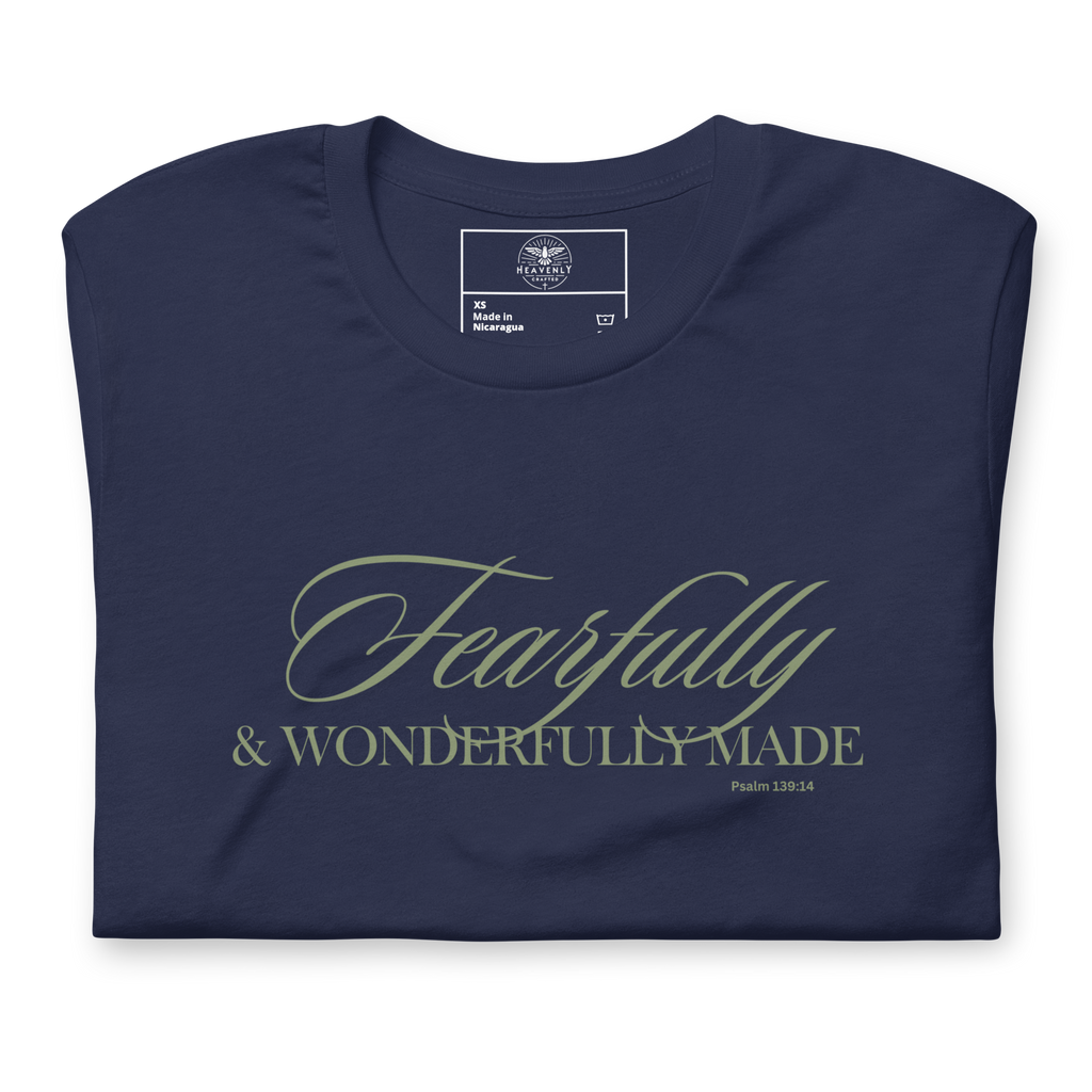 Folded Navy T-shirt with 'Faithfully and Wonderfully Made' in gold script