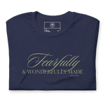 Folded Navy T-shirt with 'Faithfully and Wonderfully Made' in gold script