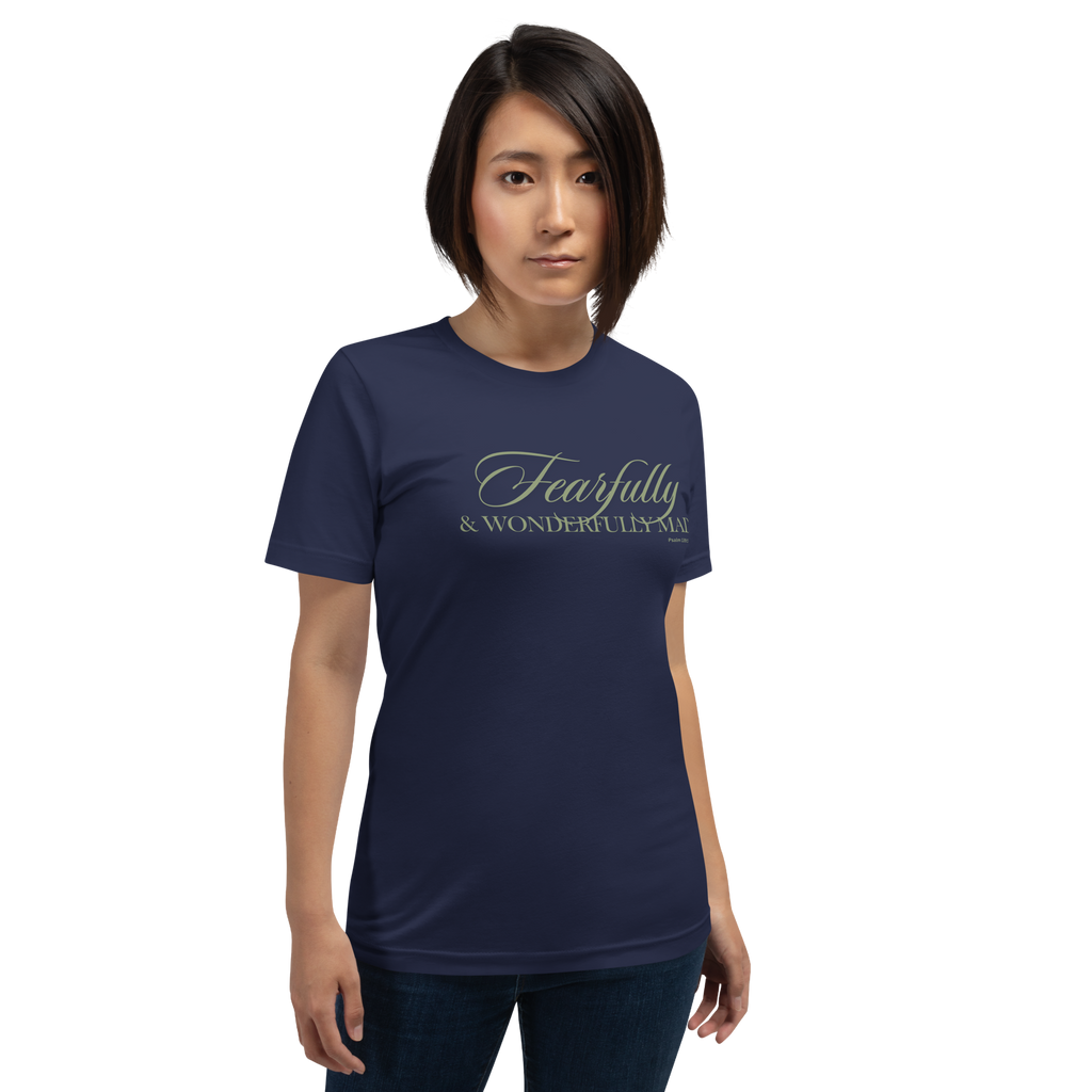 Model wearing the 'Wonderfully Made' T-shirt in Navy, three-quarter view. Female
