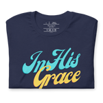 Folded Navy T-shirt with 'In His Grace' in beautiful white fancy script.