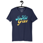 Navy 'In His Grace' T-shirt on a wooden hanger, showcasing the front script.