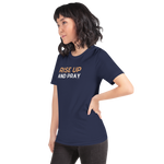 Model wearing 'Rise Up and Pray' navy T-shirt, three-quarter view.