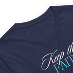 Logo stamp inside 'Keep the Faith' T-shirt, showing brand and care instructions.