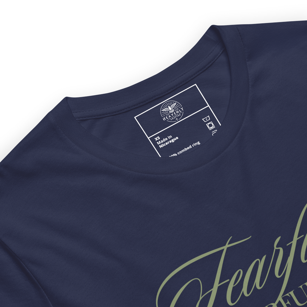 Inside label of 'Wonderfully Made' T-shirt, showing fabric and care details.