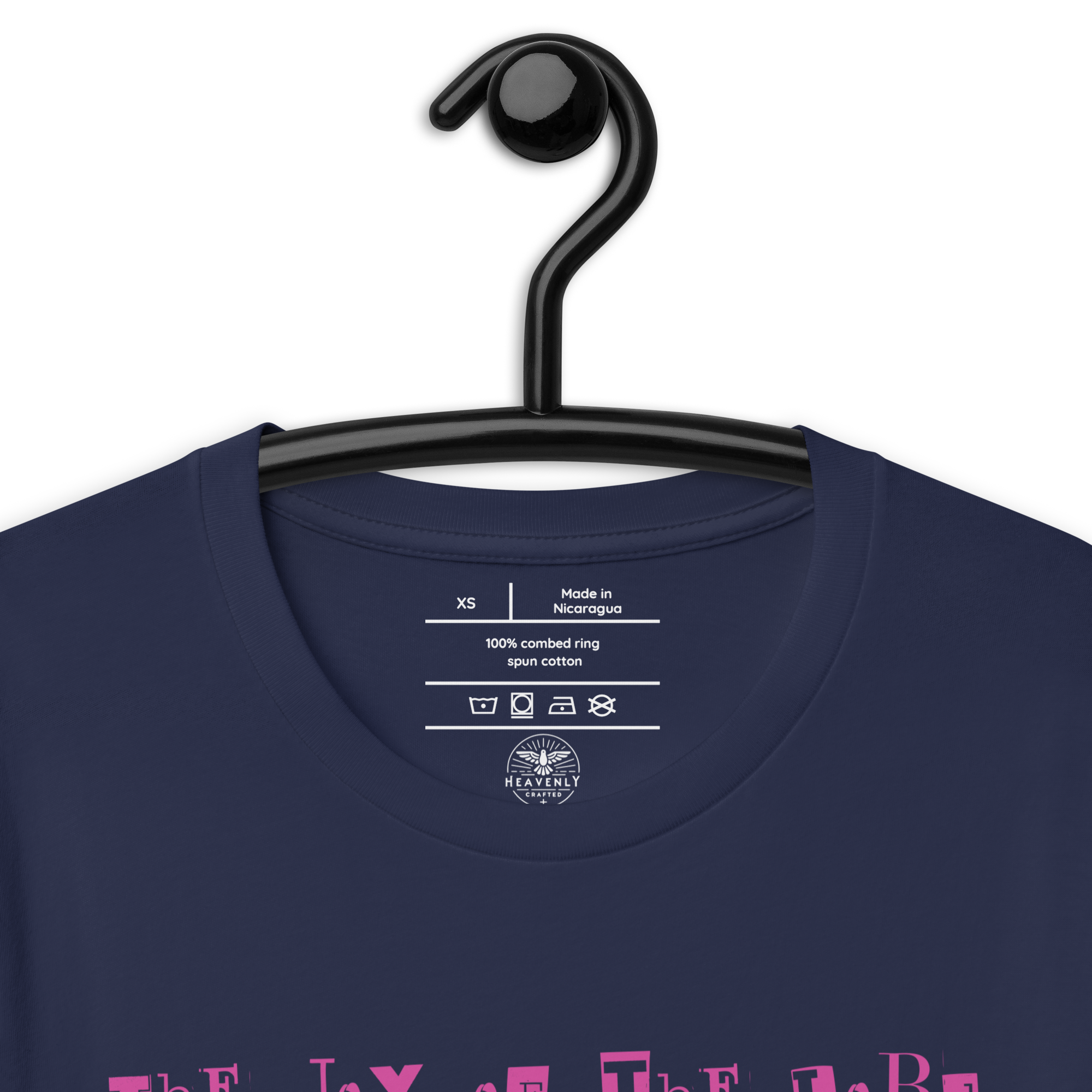 Close view of navy T-shirt on a hanger, plain. Close up view of Logo