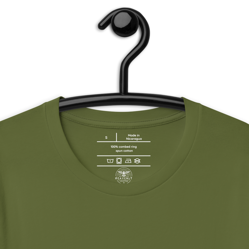 Logo stamp inside the 'Army of Faith' T-shirt in Army Green, displayed on a hanger. Showcases brand details and care instructions, emphasizing quality craftsmanship and the faith-inspired design.