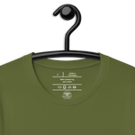 Logo stamp inside the 'Army of Faith' T-shirt in Army Green, displayed on a hanger. Showcases brand details and care instructions, emphasizing quality craftsmanship and the faith-inspired design.
