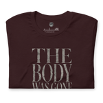 Close-up of Gospel Noir collar label inside Christian streetwear t-shirt Oxblood folded Shirt