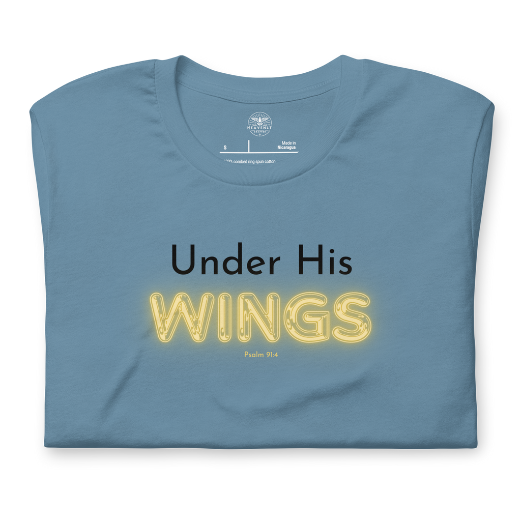 Folded navy blue T-shirt with 'Under His' in black text and 'Wings' in glowing yellow.