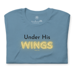 Folded navy blue T-shirt with 'Under His' in black text and 'Wings' in glowing yellow.