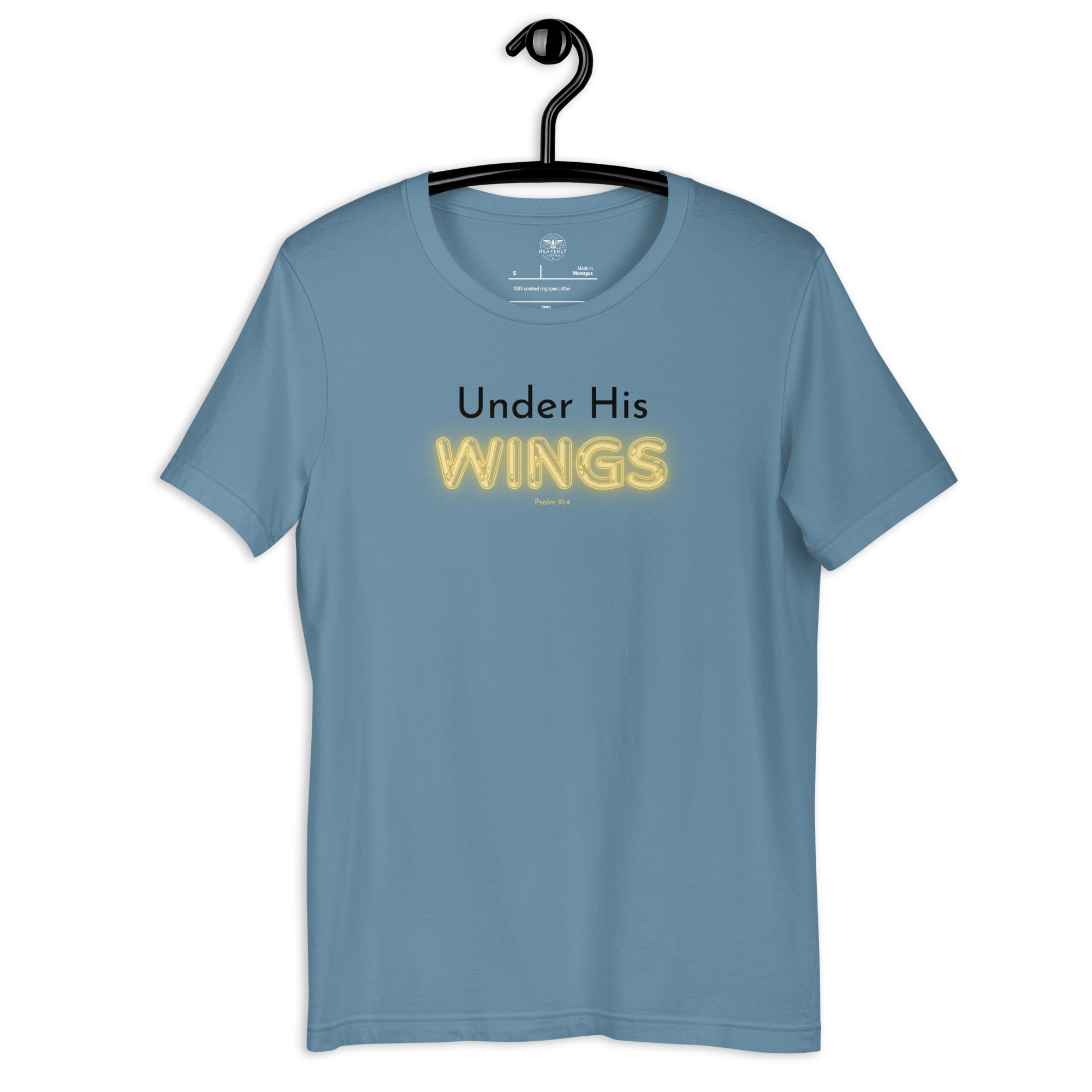 Navy blue 'Under His Wings' T-shirt hanging on a wooden hanger.